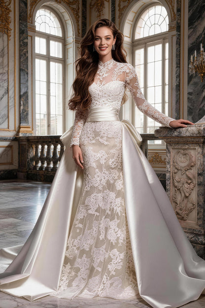 Fitted, ruched wedding gown featuring white tulle, satin, and a voluminous skirt.