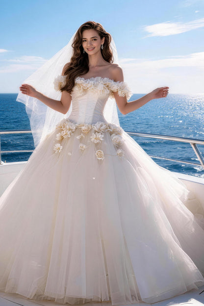 White fitted tulle wedding gown featuring ruching, floral details, and a voluminous skirt.