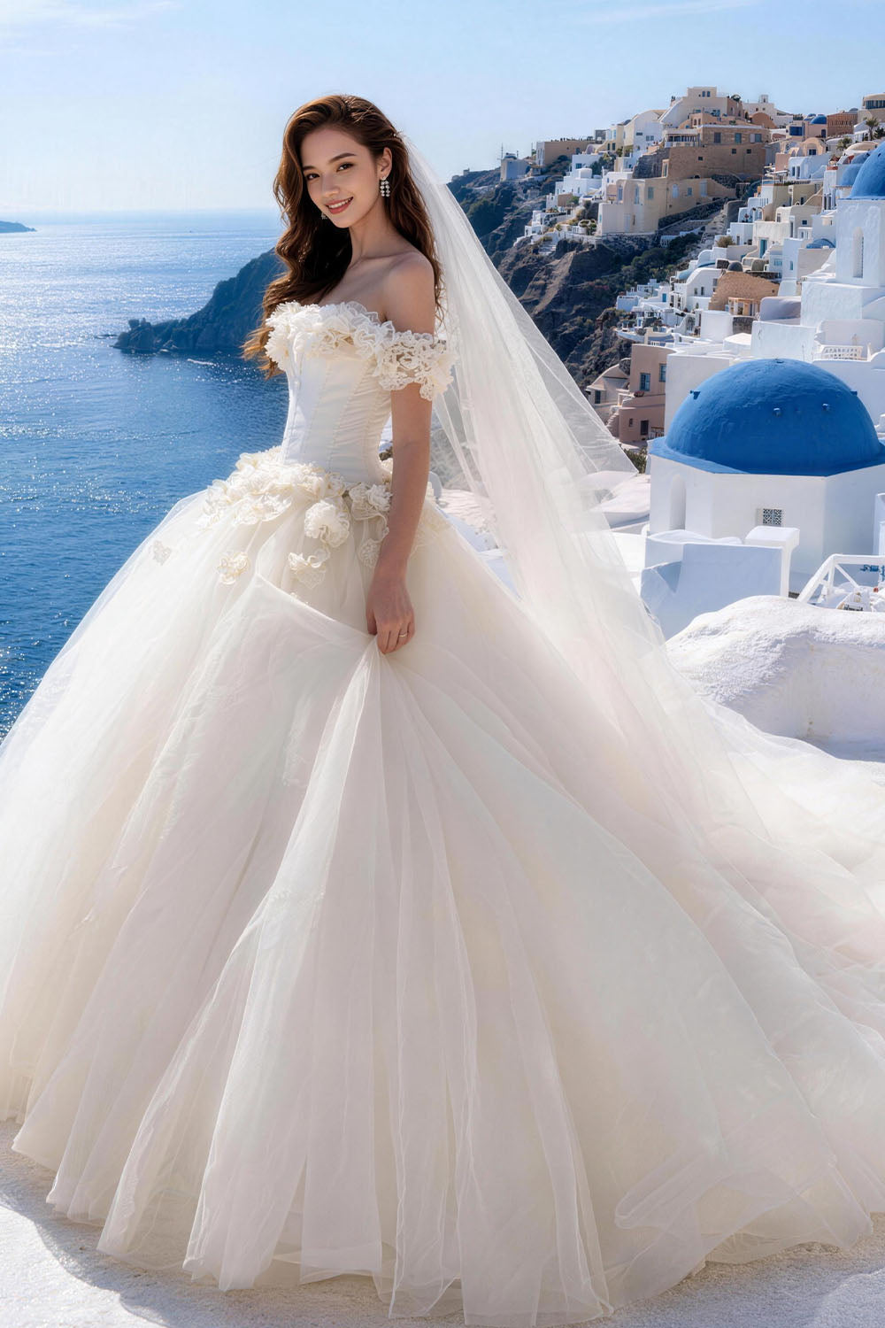 White fitted tulle wedding gown featuring ruching, floral details, and a voluminous skirt.