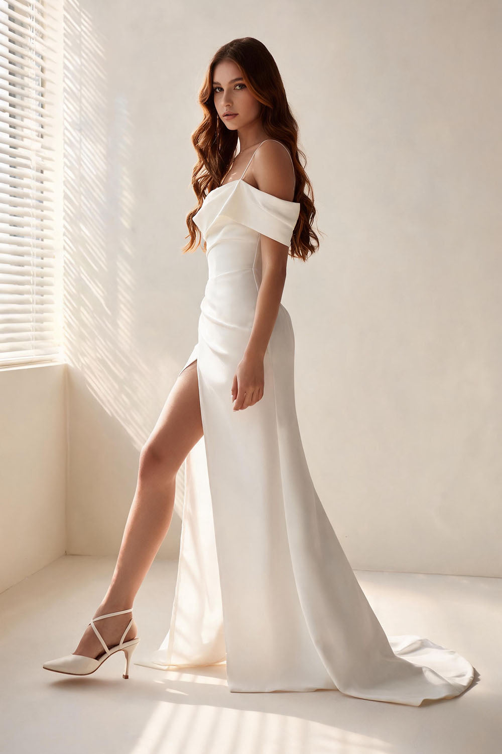 White fitted off-shoulder halter-neck mermaid dress