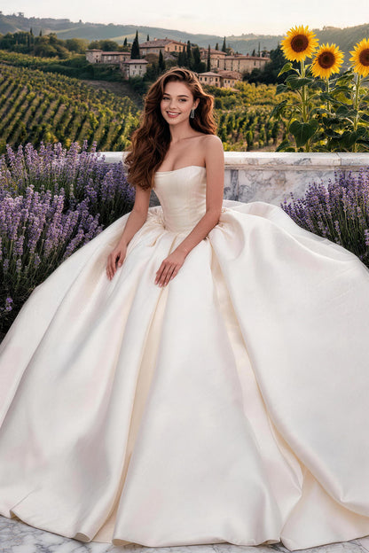 Fitted white satin wedding gown with ruching and a voluminous skirt.