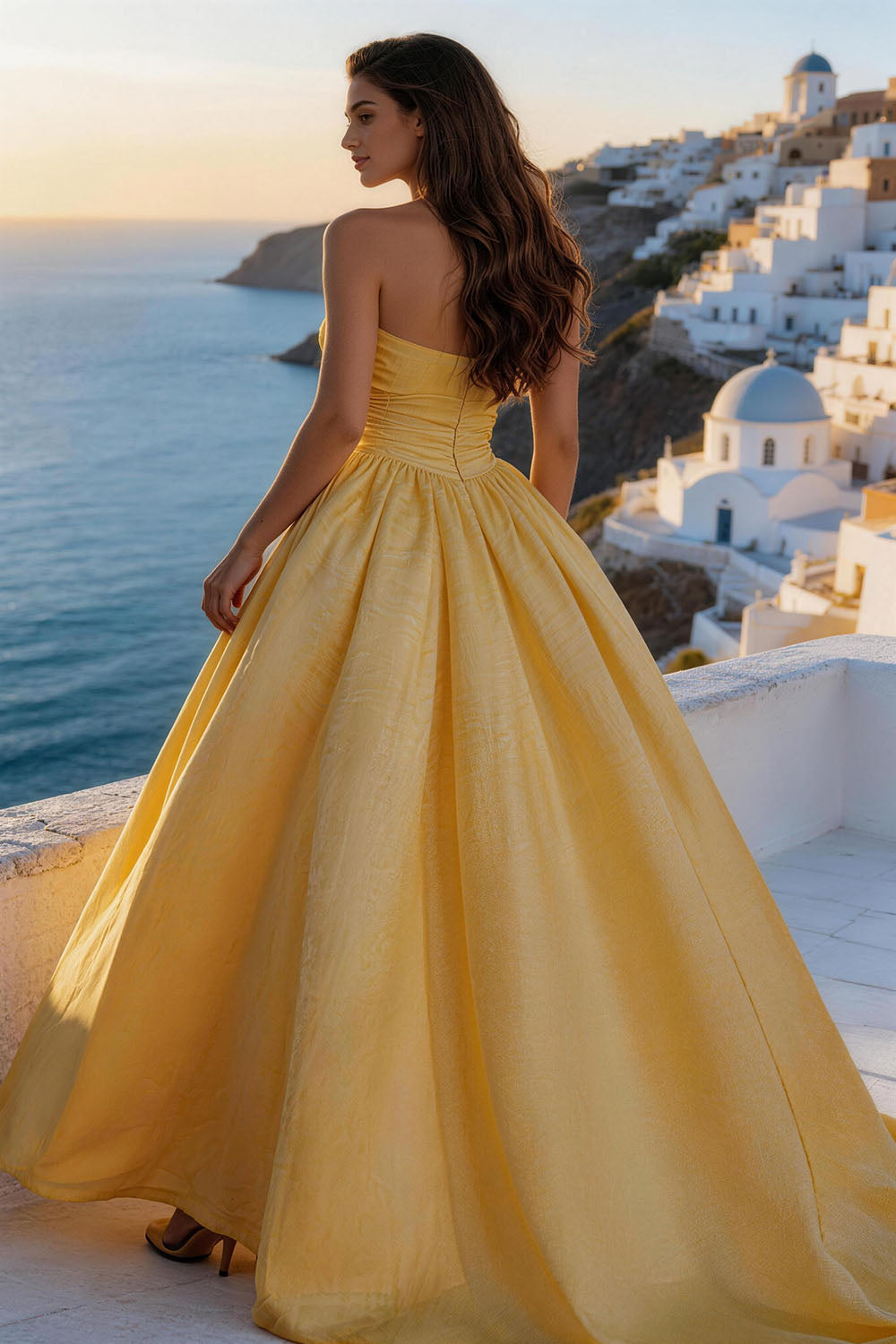 Yellow lightweight linen fitted, ruched, strapless gown